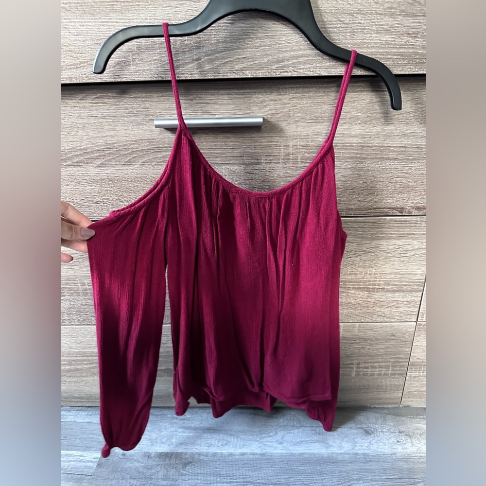 Red shoulderless blouse